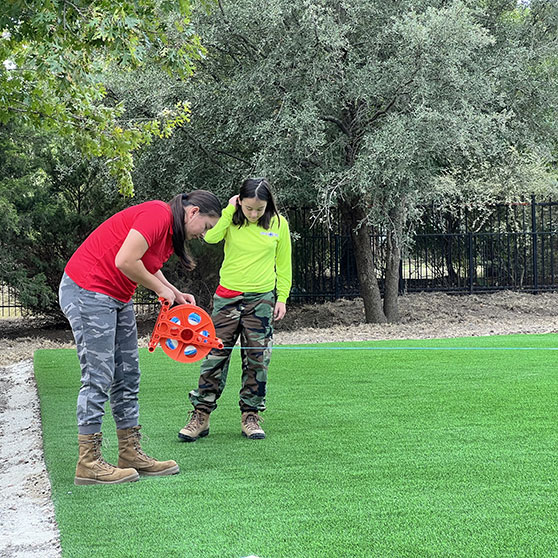 FIELD OPS employees working on field