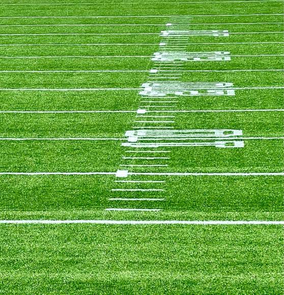 newly painted numbers painted on football field in farmington, nm