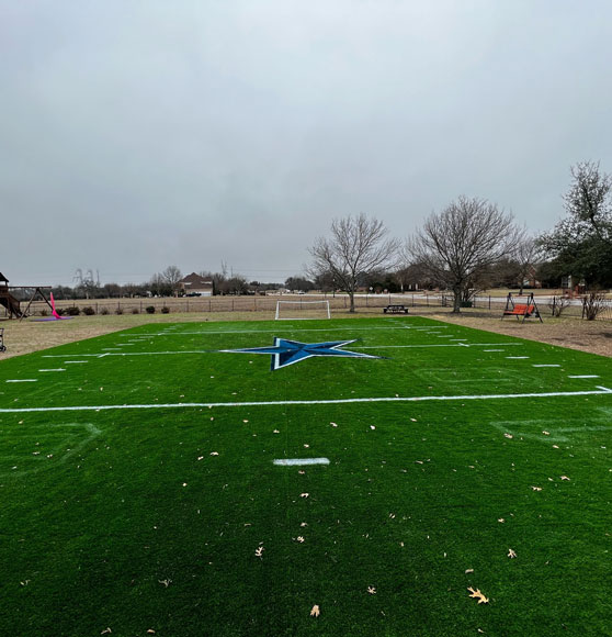 newly striped football field markings with logo